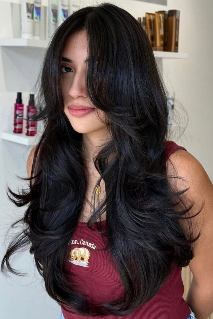 Light void feathered layers wig.