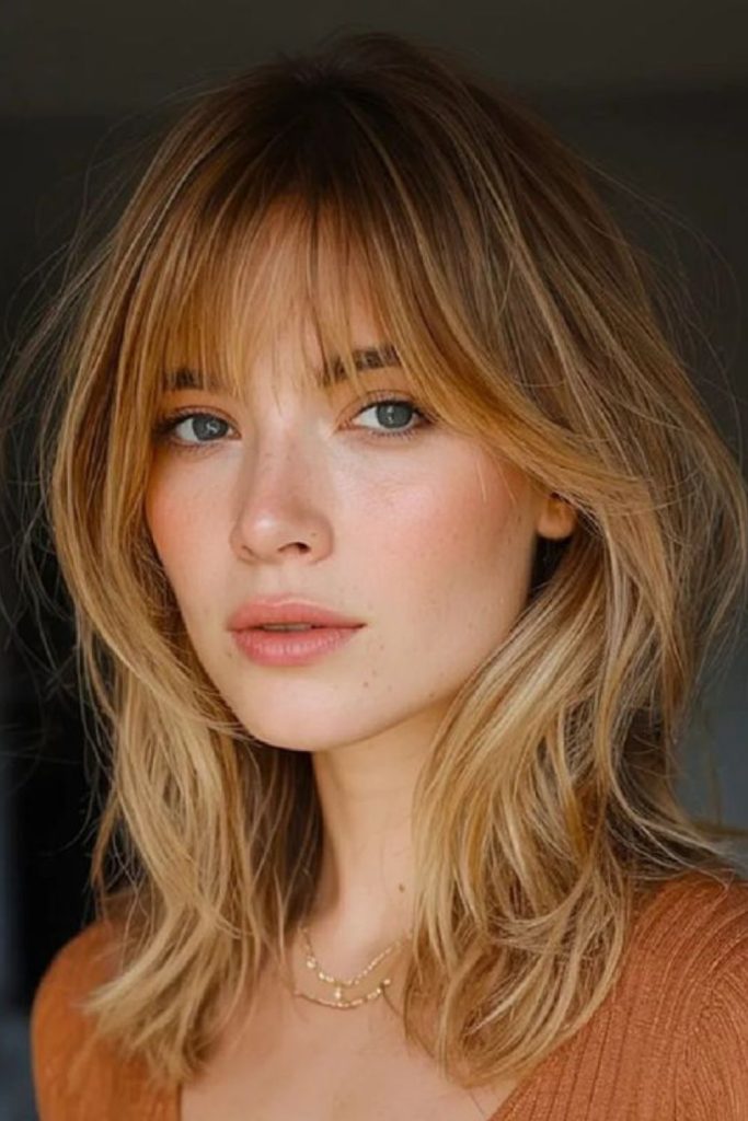 Natural messy jagged shoulder-length hair