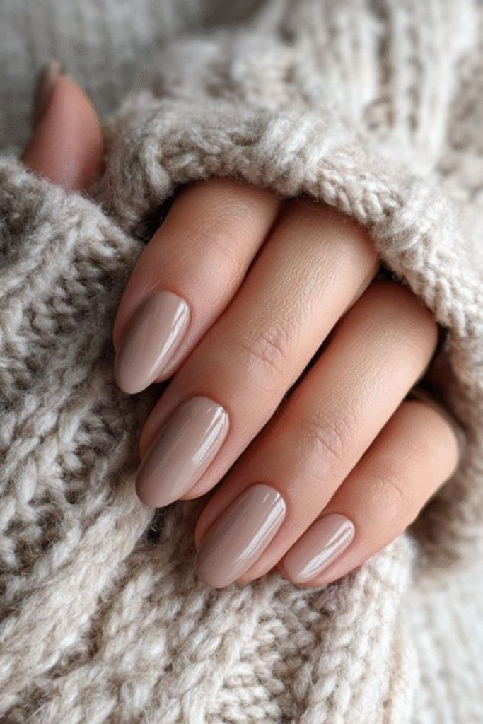 Almond beige clean nail style.