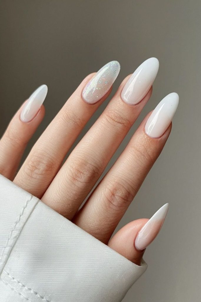 Almond-shaped nails with foggy milk tone.
