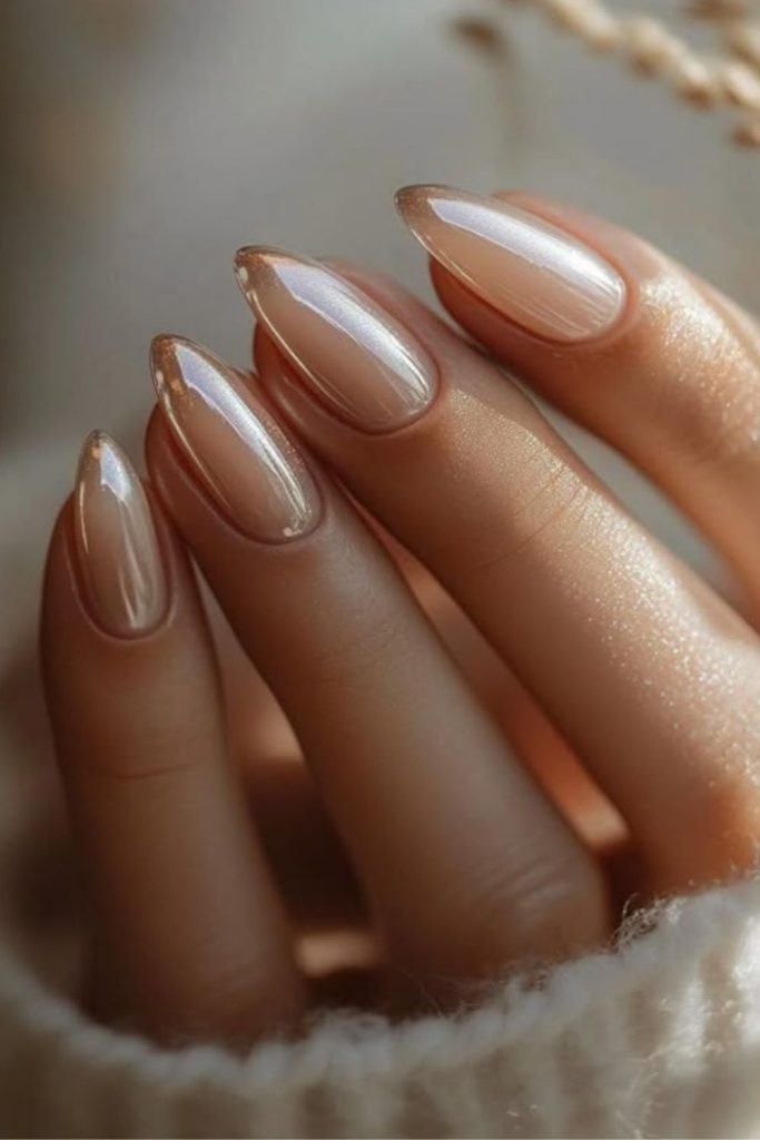 Creamy almond shaped polished nails