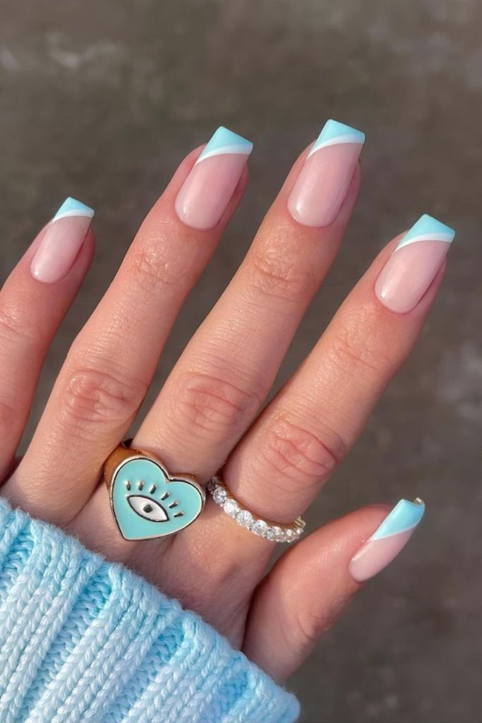 Water blue tips with nude base.