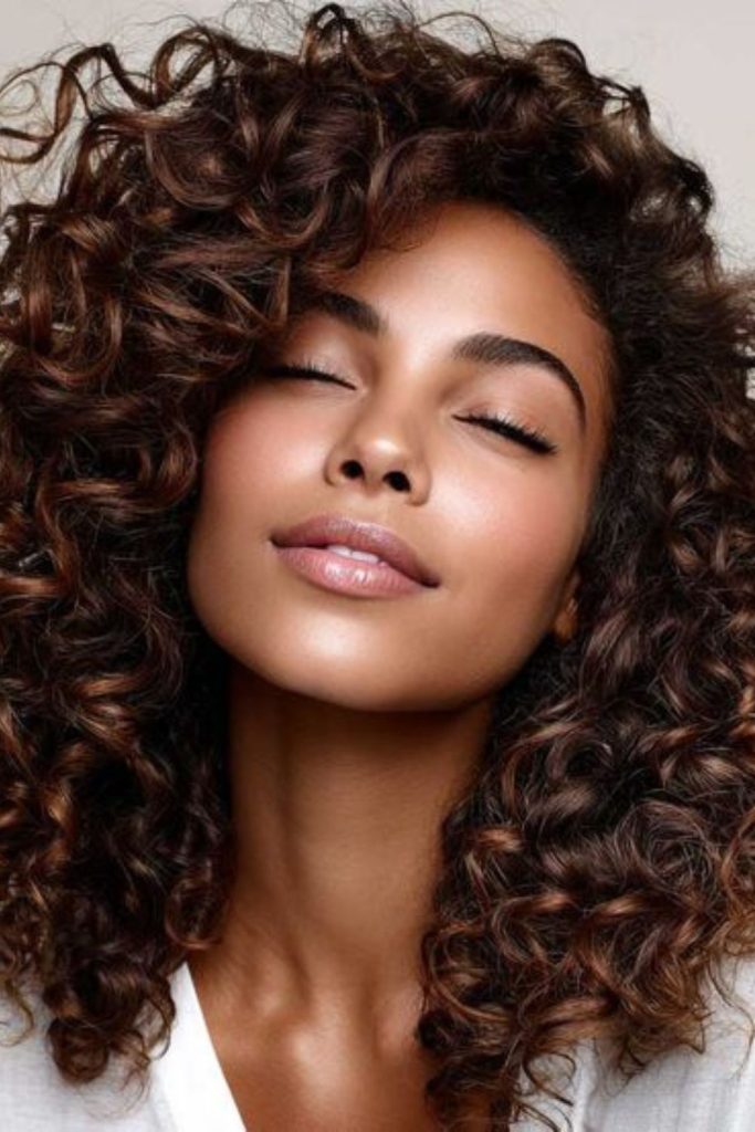 Layered curls with rugged stylish texture.