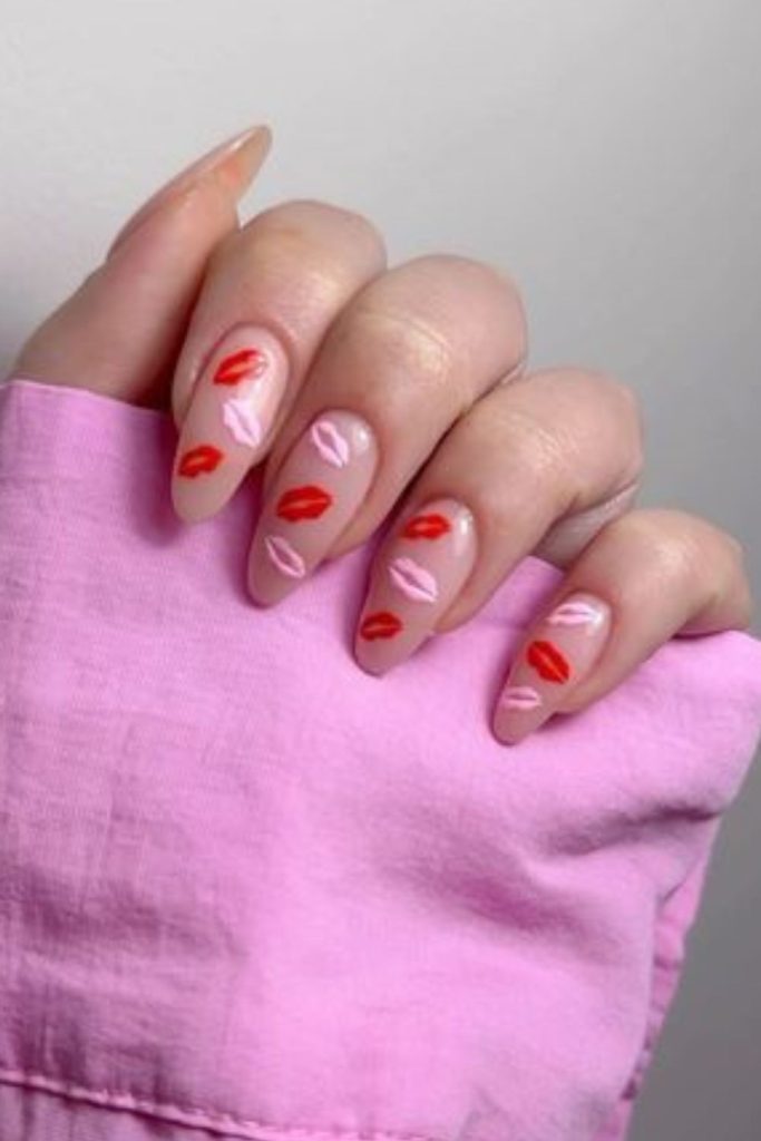 Nude nails with kiss accent.