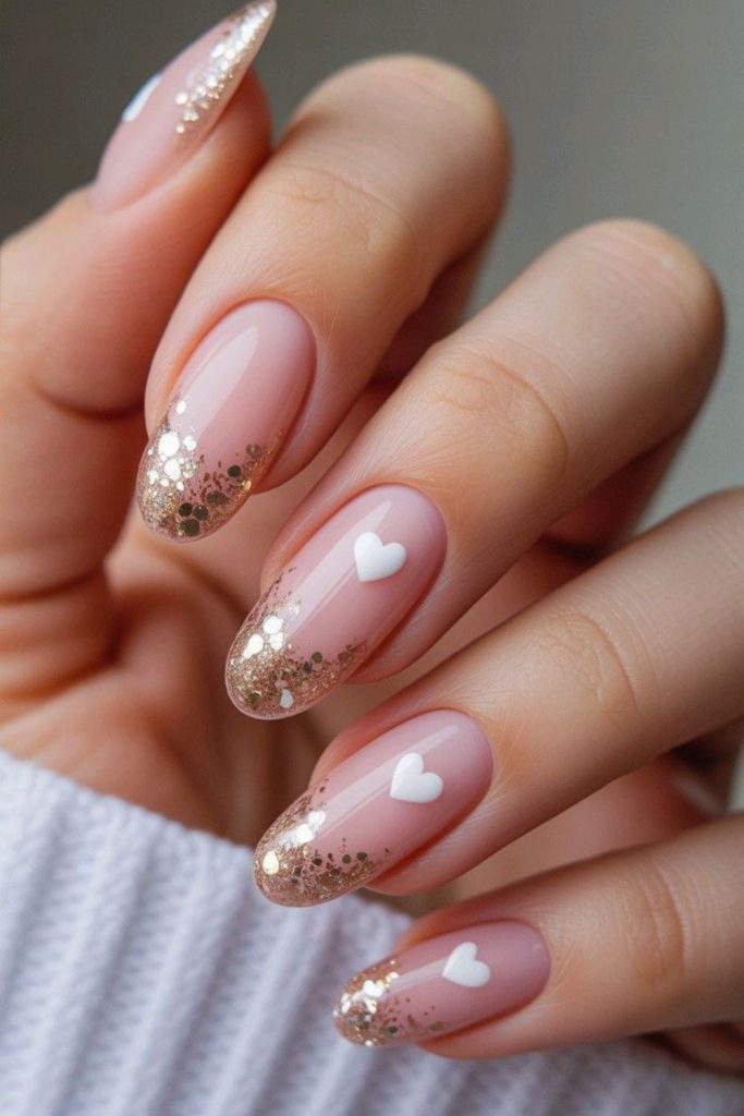 Pale pink tips with scattered confetti