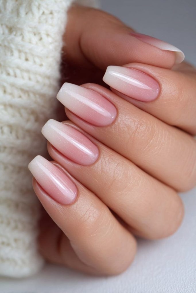 Pale rose fades into smoky cream