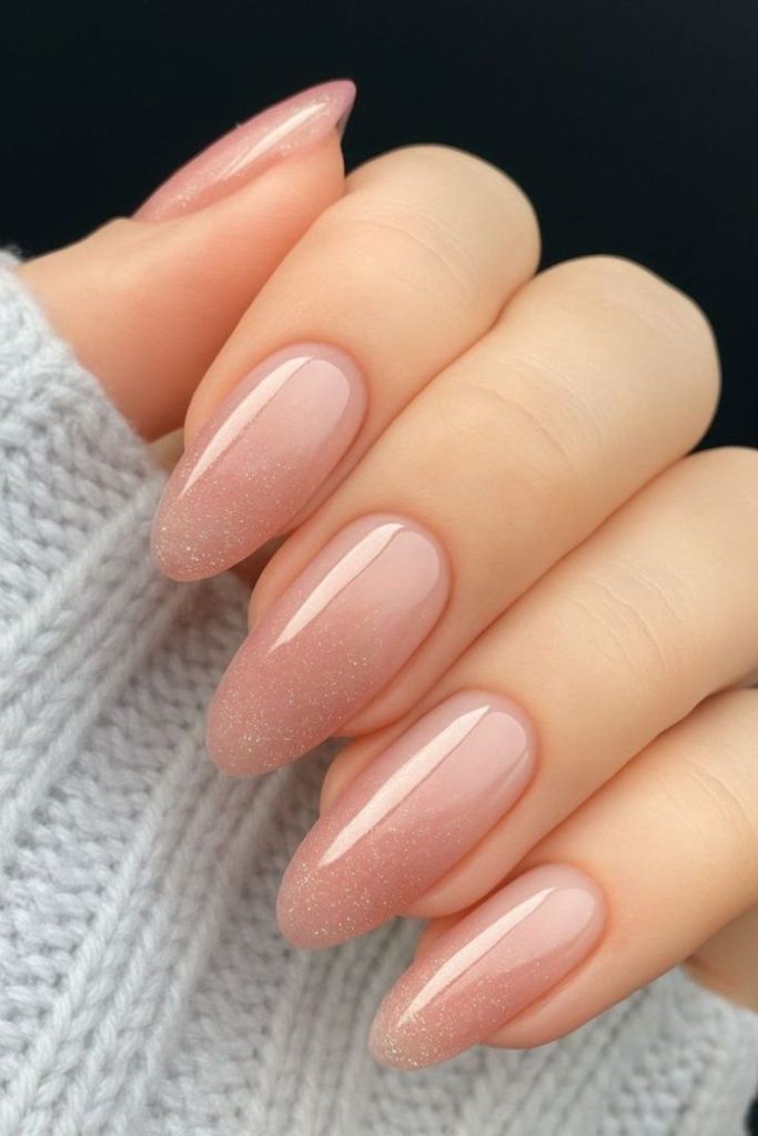 Muted rose satin nails, soft sophistication.