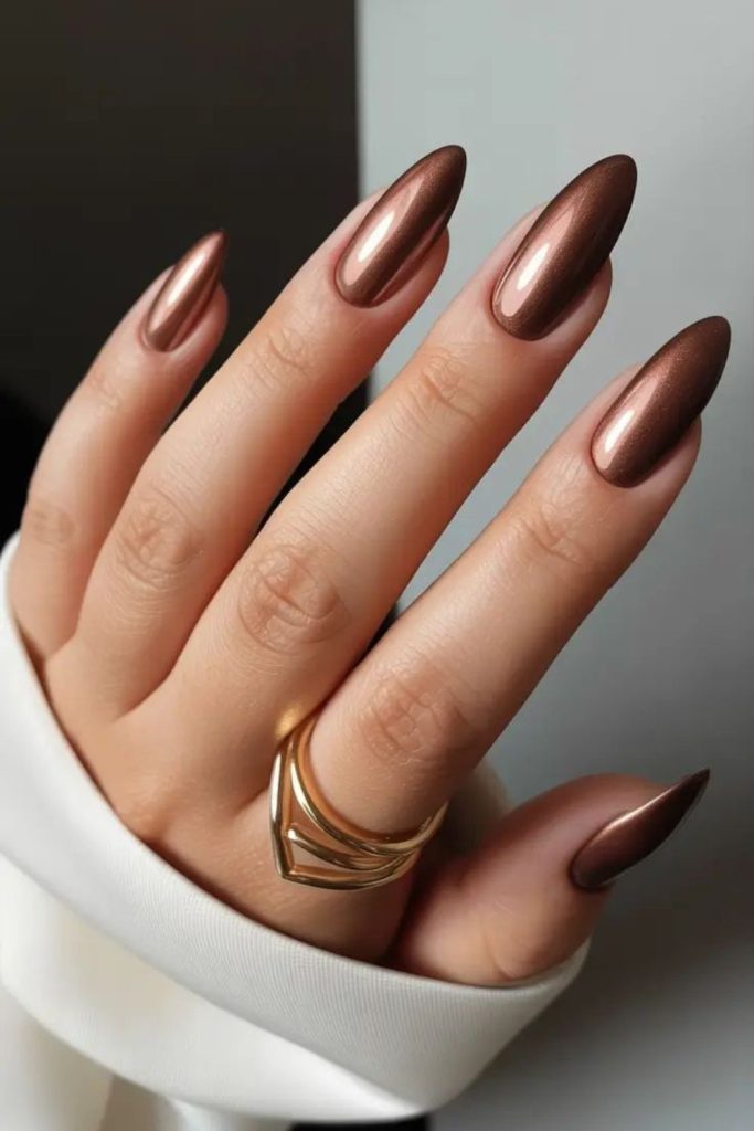 Rich mocha nails with muted luxury.