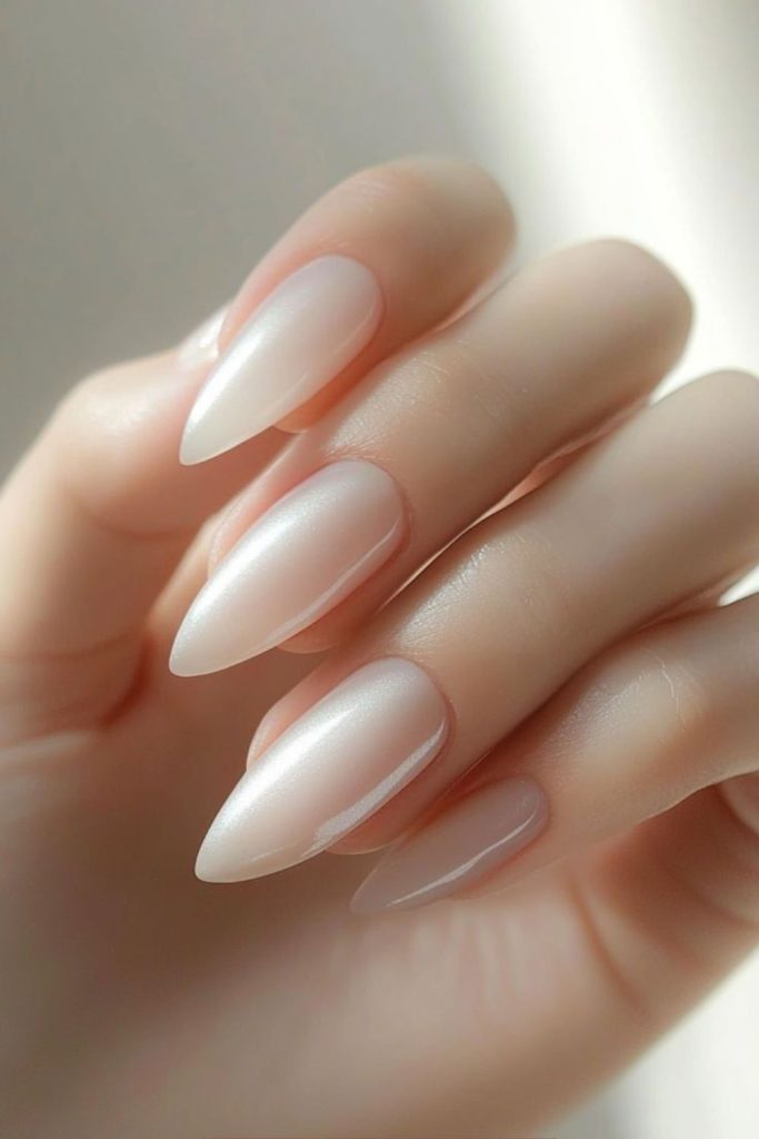 Plush cashmere milk colored nails elegance.