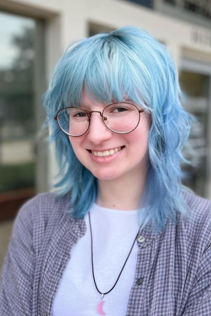 Silver-blue layered wolf cut cosmic.