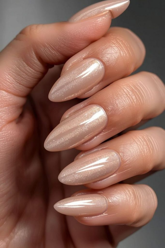 Soft champagne shimmer understated nails