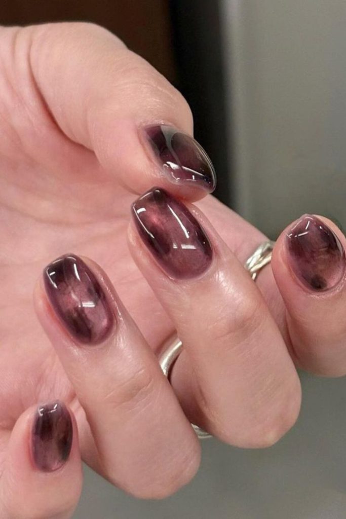 Charcoal rose cat eye manicure