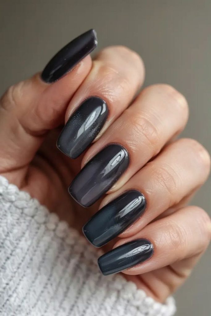 Dark gray smoky nails with glossy streaks