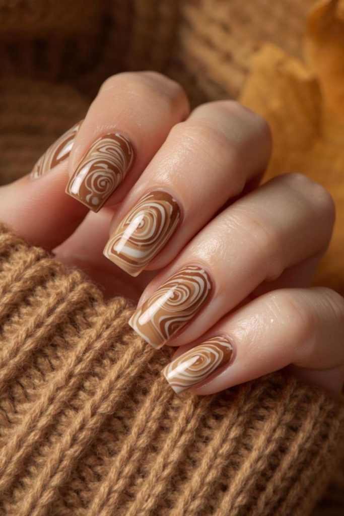 Swirled cinnamon and caramel winter nails