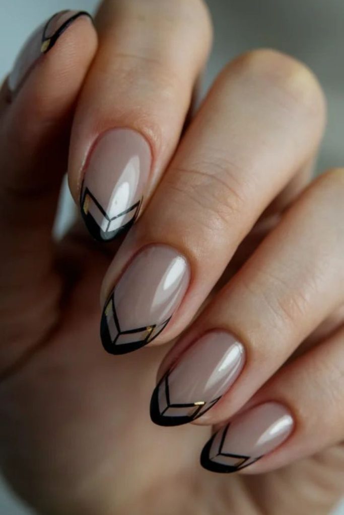 Small triangles on black nail tips