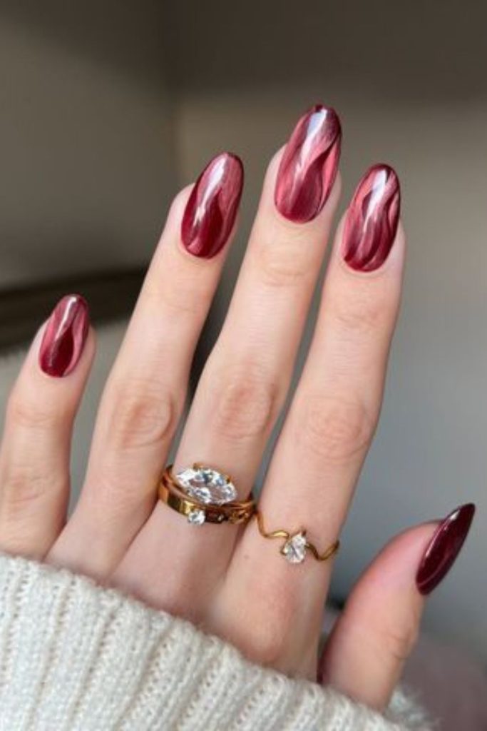 Crimson chrome glossy Valentine manicure.