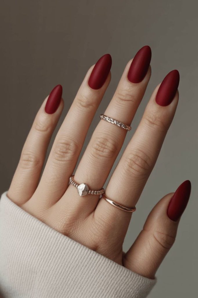 Matte crimson bold Valentine nails.