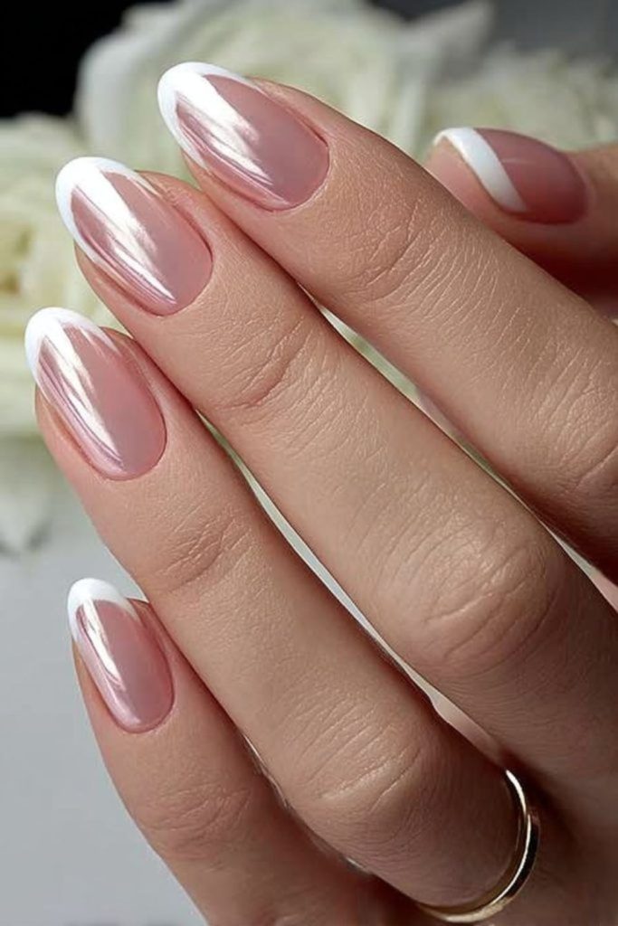 Frosted translucent tips on nude nails.