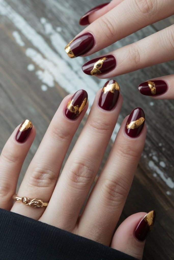 Dark red nails with copper flecks.