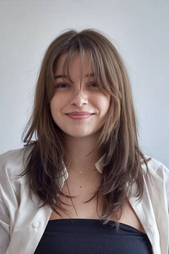 Feathered fringe with soft face-framing layers