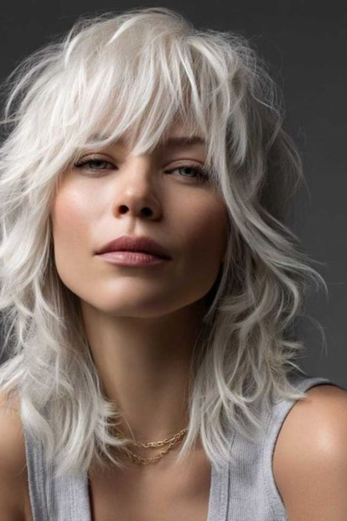 Silver jagged wolf cut icy.