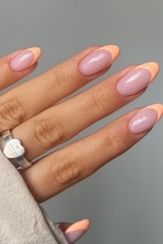Soft peach tips on nude base.