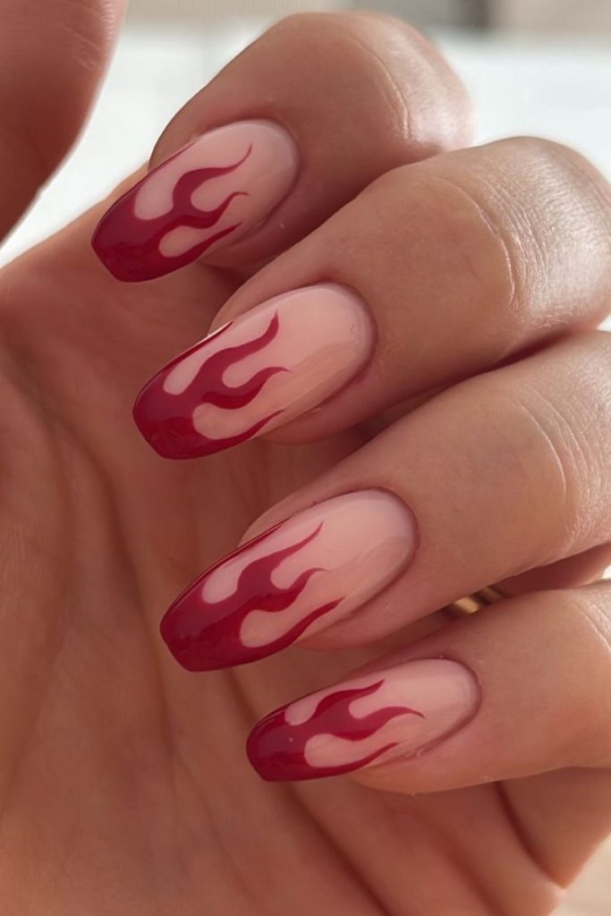 Garnet flame tip Valentine nails.