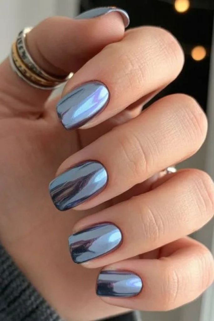 Ash gray nails with subtle metallic sparkles