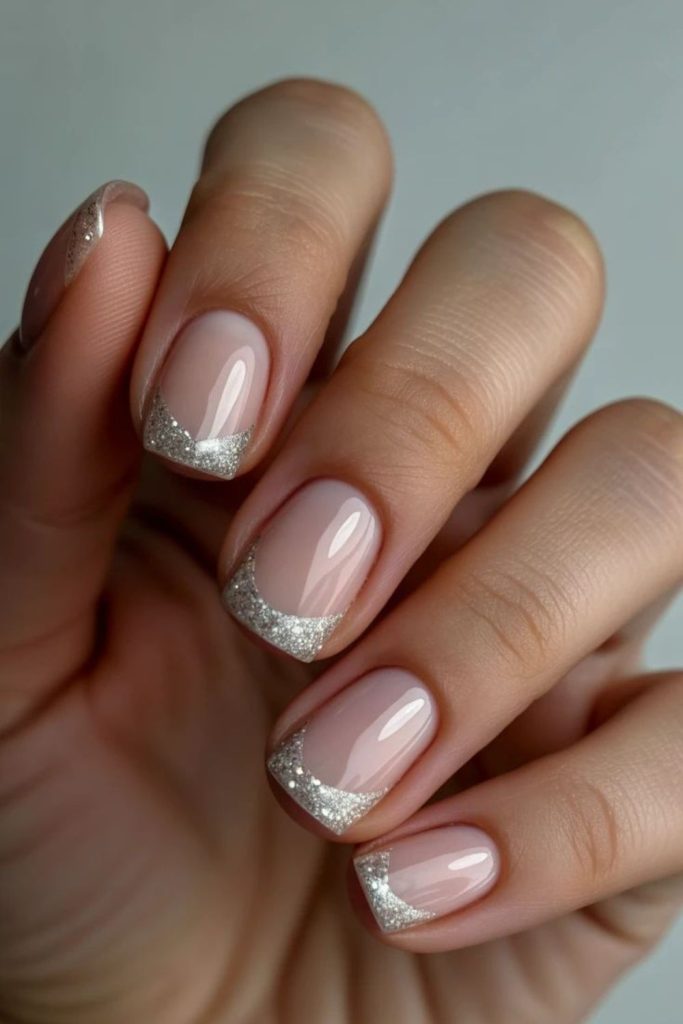 Silver glitter square French tip nails.