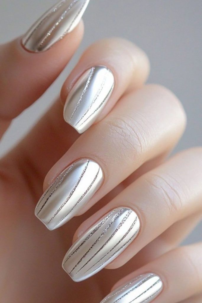 Vertical silver lines on icy nails