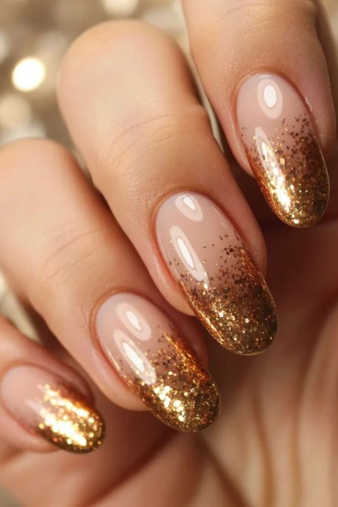 Apricot to gold gradient shimmer nails.