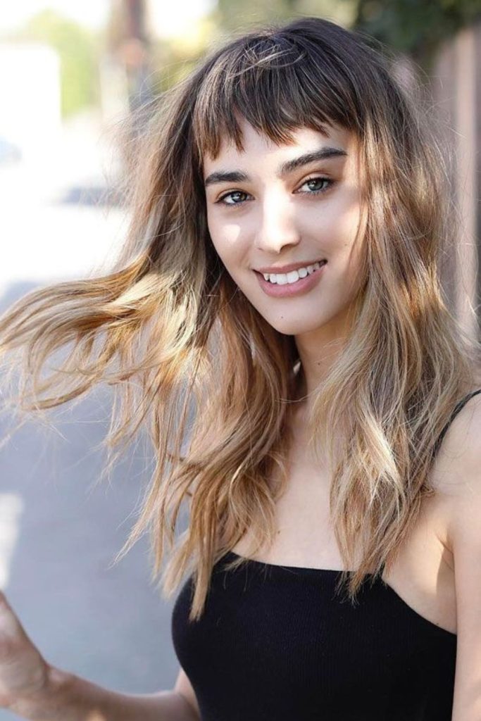 Warm honey fringe with flowing length