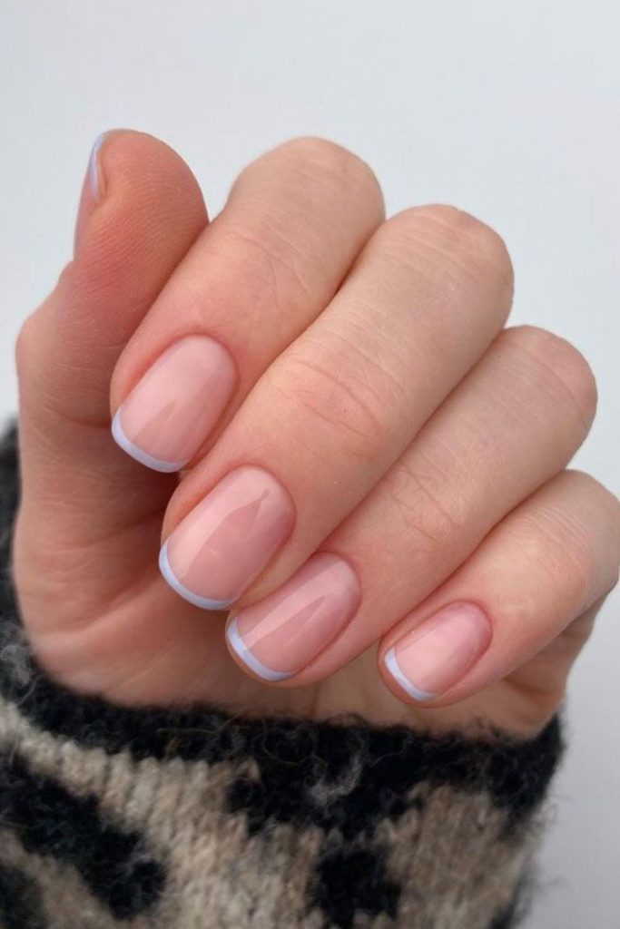 Icy lilac tips on nude base.