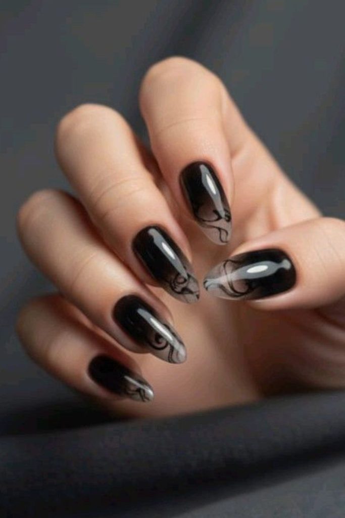 Vein-like lines over black matte nails