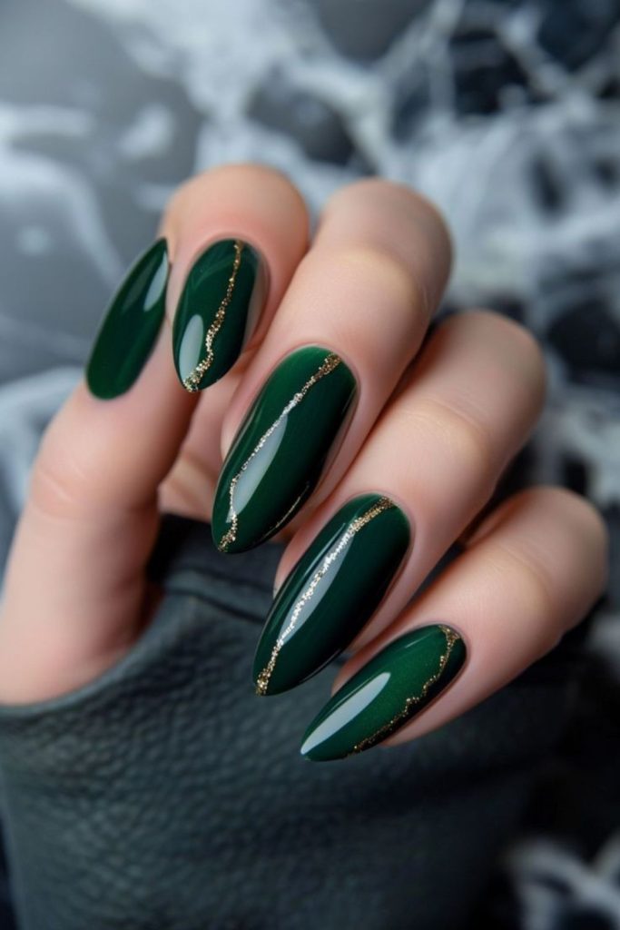 Soft green nails with golden veins.