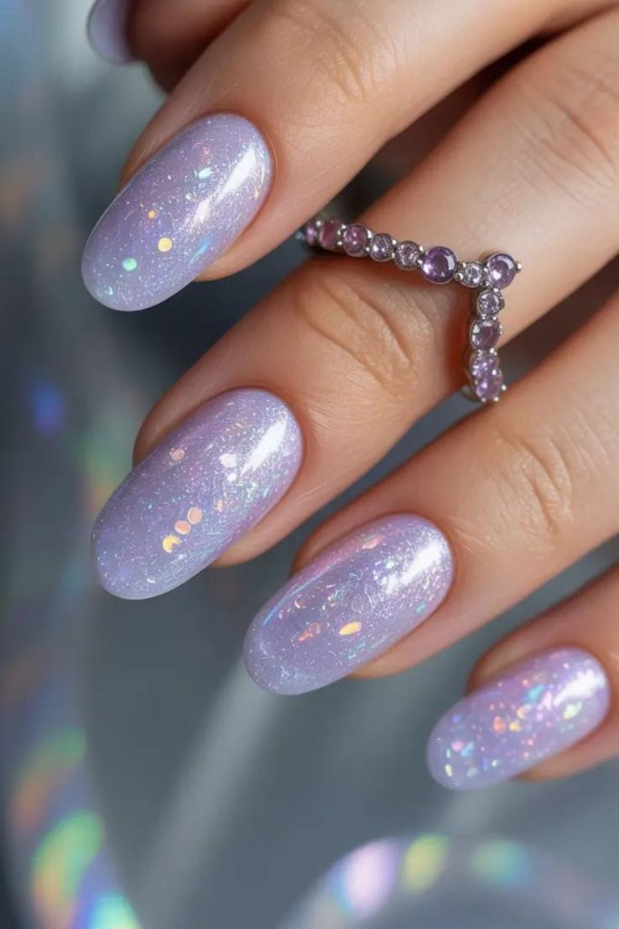 Lavender frost drifts across translucent nails