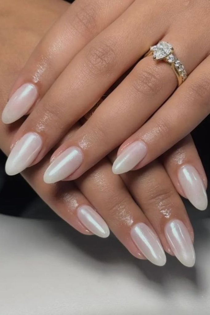 Linen-inspired soft milky nail coat.