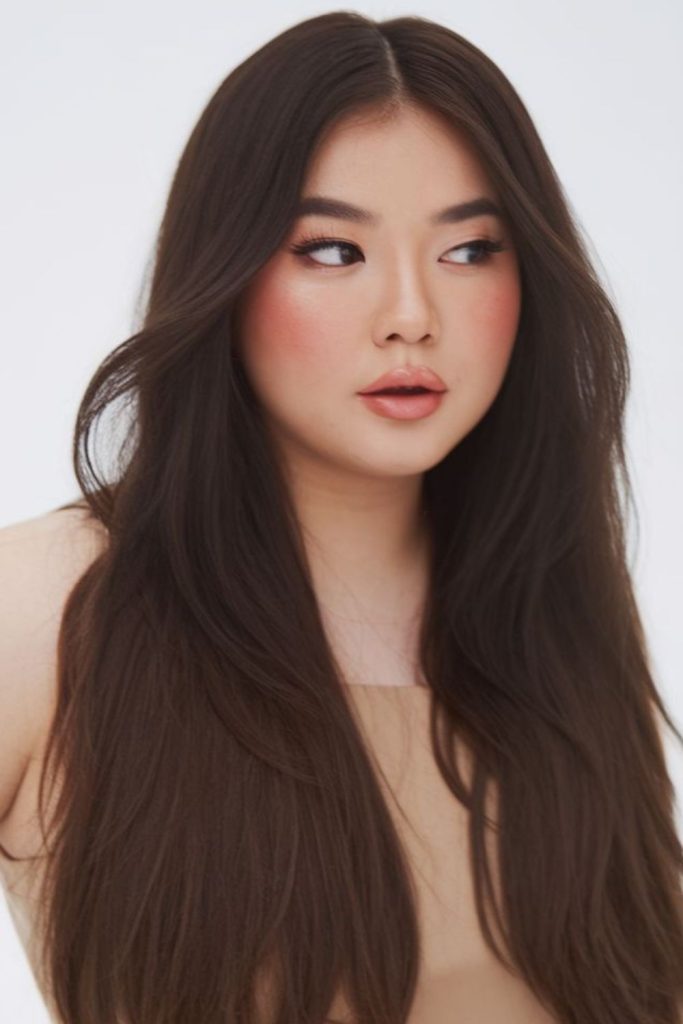 Long layers framing cheeks softly