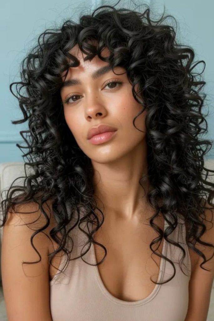 Soft flowing curls with romantic vibe.