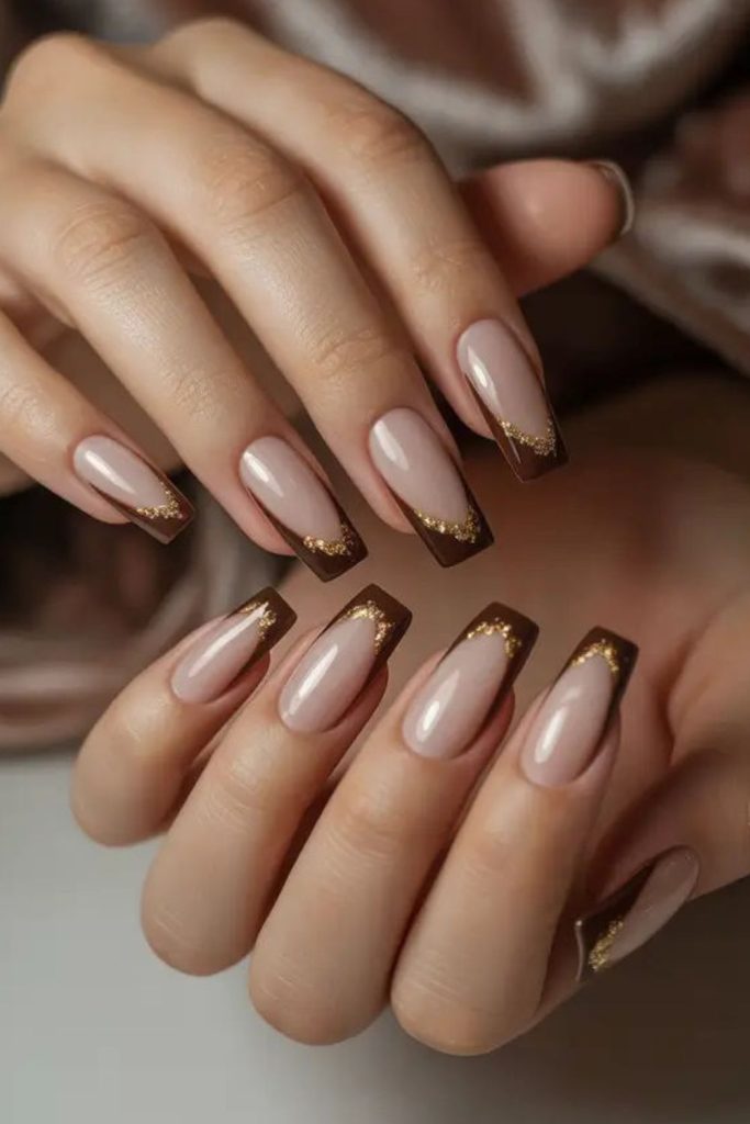 Bronze metallic square French nails.