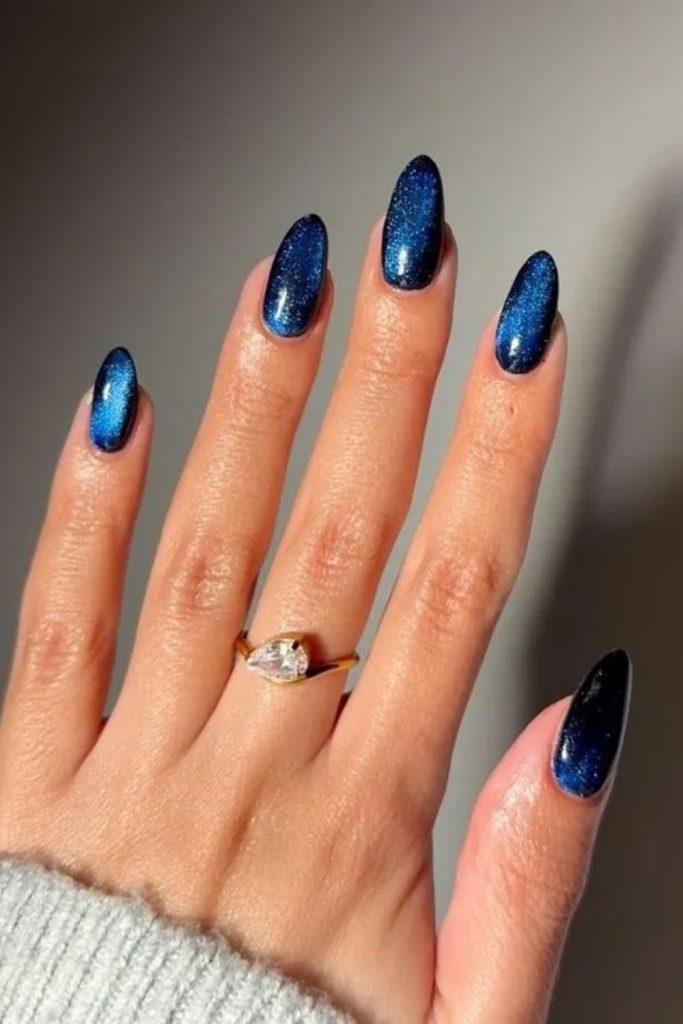 Midnight chrome cat eye nails
