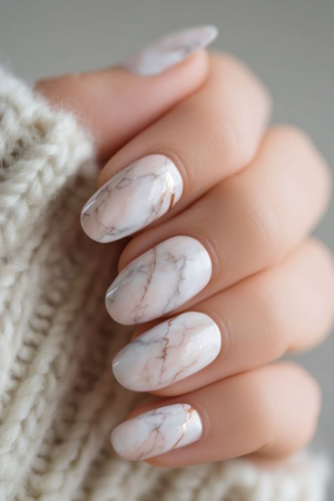 Marble-inspired milky nails gentle pattern.