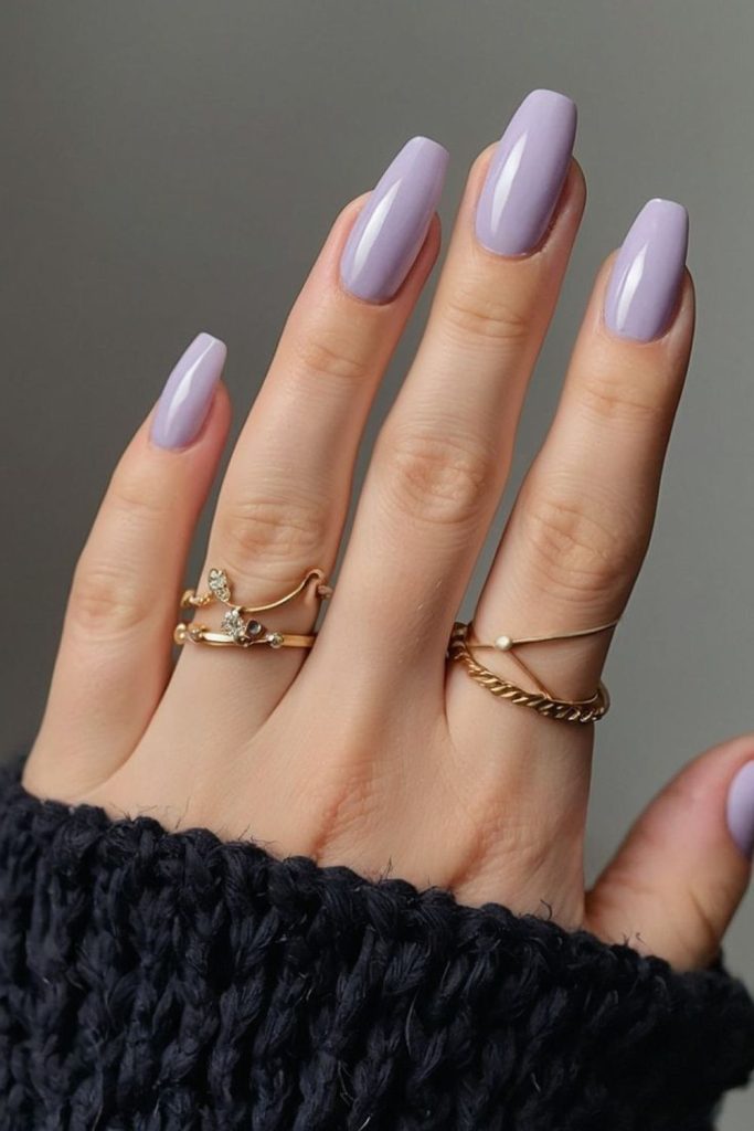 Lavender nails with calm whimsical elegance.