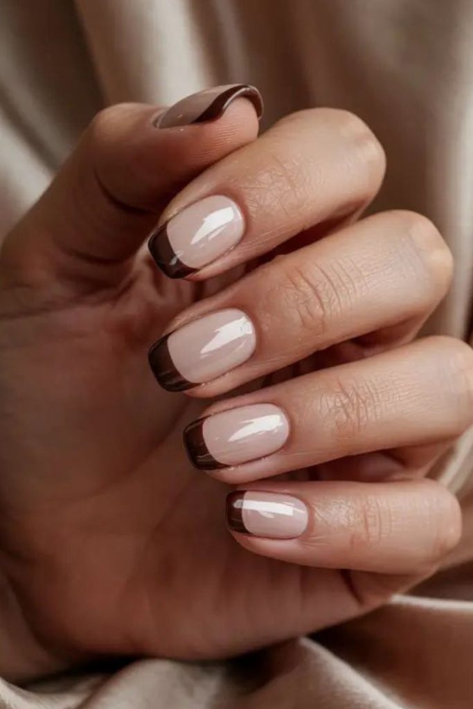 Chocolate tips over caramel nude.