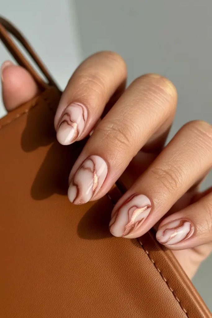 Creamy mocha marbled winter-inspired nails