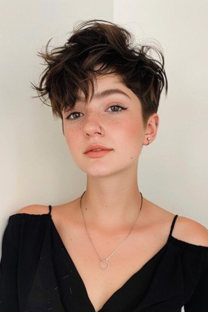 Dark layered pixie with celestial vibes.