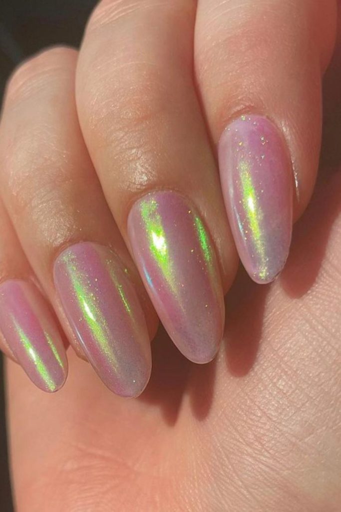 Opalescent nails with pastel shimmer veins.