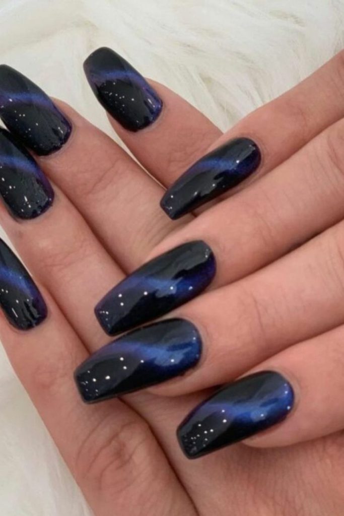 Nebula inspired indigo nail design