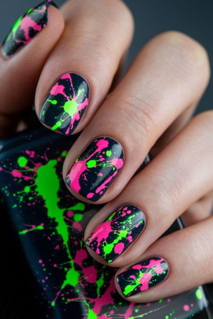 Bright nails with chaotic neon glitter splashes.