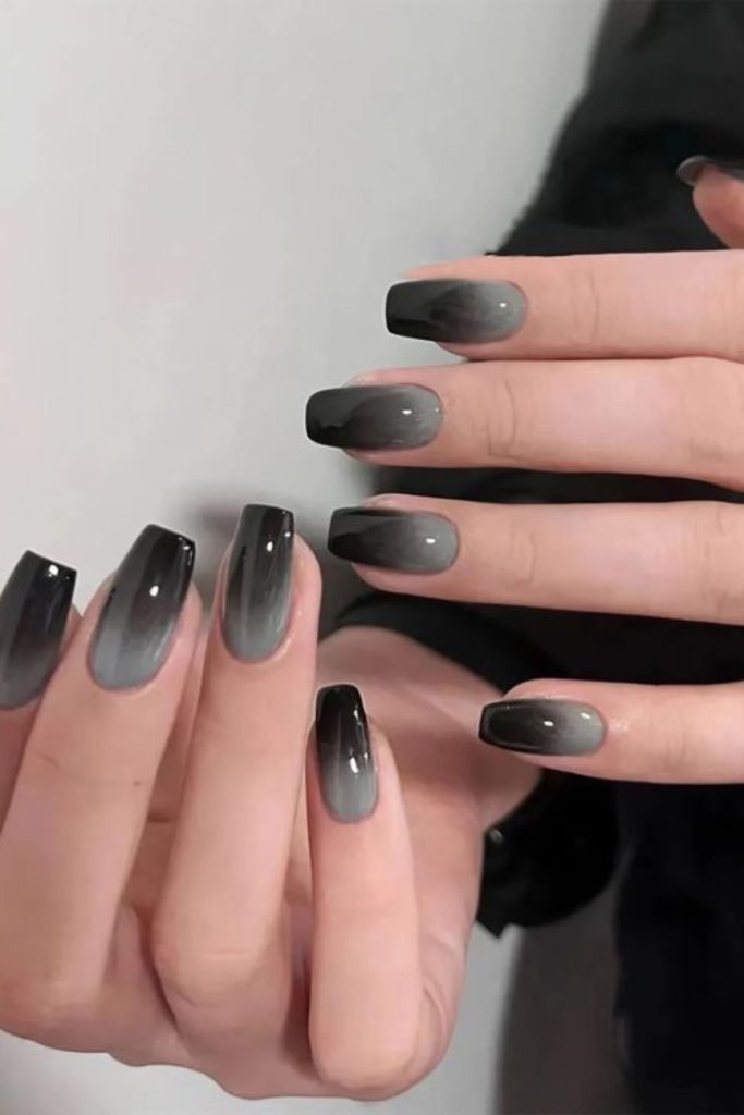 Black fading to light gray nails